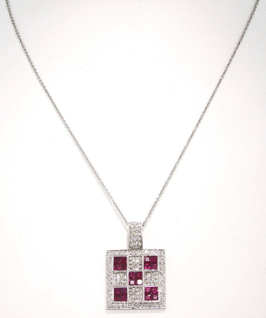 18KT White Gold 2ct Ruby and Diamond Squares Pendant FJ: "18KT White Gold 2ct Ruby and Diamond Squares Pendant FJM783. Excellent Condition! MU348HD. One 18KT white gold ruby and diamond squares pendant. Features princess cut rubies weighing a total of 2.00c