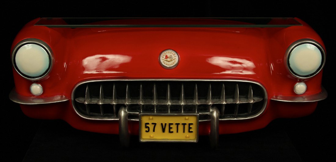 57' Corvette Front End 3D Hanging Shelf GM7: 57' Corvette Front End 3D Hanging Shelf GM7. Excellent Condition! BE15WP. One hanging tempered glass shelf supported by a hand painted red 3D 1957 Chevrolet Corvette front end. Dimensions: 20.75 lengt