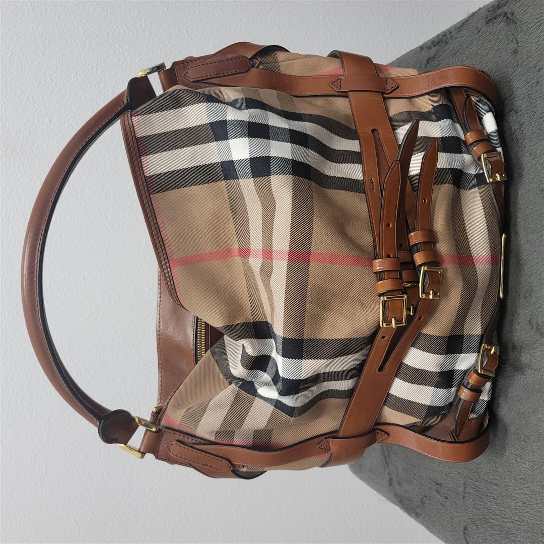 Burberry Gosford House Check Bridle Buckle Tote Bag: One Burberry Gosford House Check Bridle Buckle Tote Bag. Dark Tank Check, Brown Leather Detail 15" H x 15" W x 4" D Interior zip pouch & inner divider