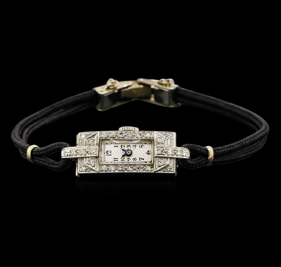 Vintage Eloga Diamond Ladies Watch: One ladies, vintage Eloga diamond wristwatch electronically tested, platinum, Case: 23mm x 10mm, Case Back: space available for engraving, Crown: scalloped, Bezel: diamond set, Case Lugs: diamond set,