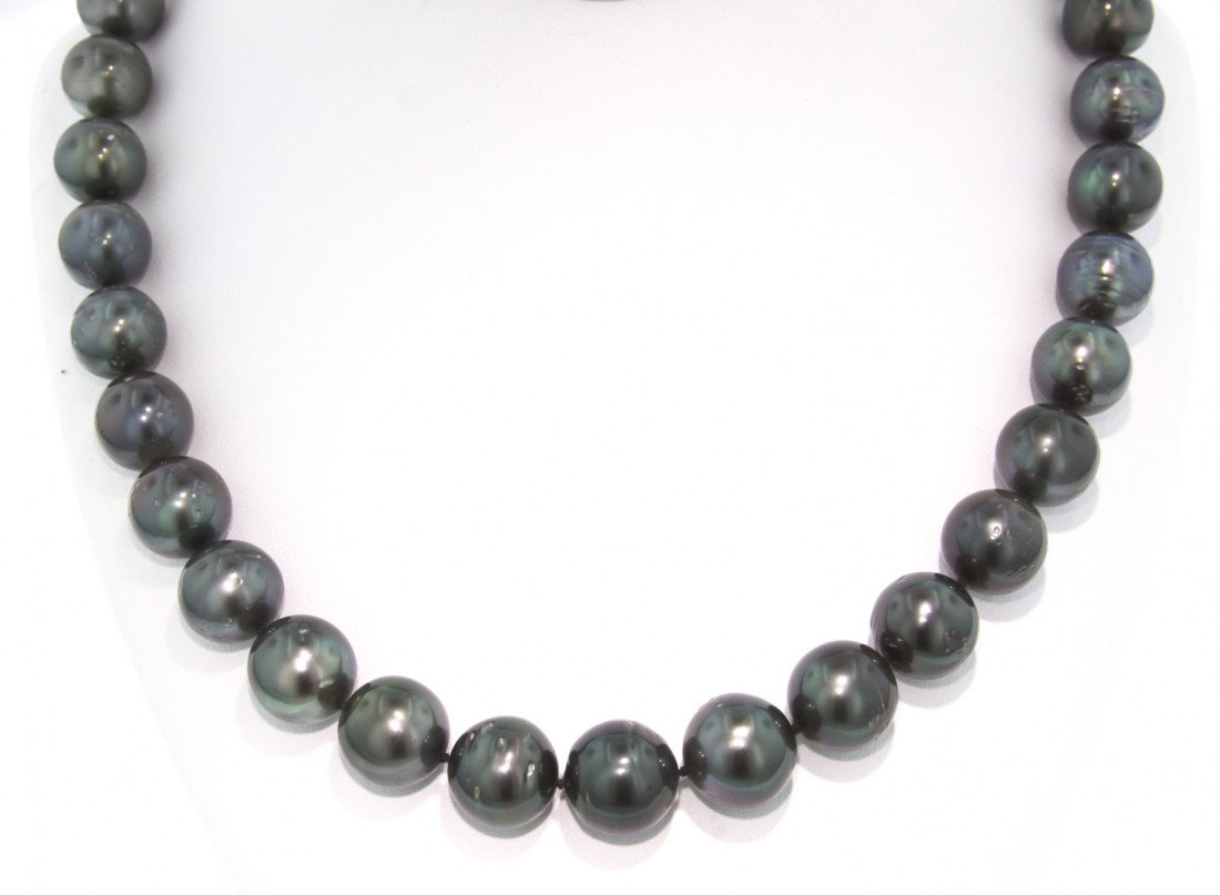 Tahitian Cultured Pearl Necklace RM233: "Tahitian Cultured Pearl Necklace RM233. Great Condition! HM768KF. One graduated single strand pearl necklace eighteen inch princess length, knotted with a 14KT white gold ten millimeter scalloped plu
