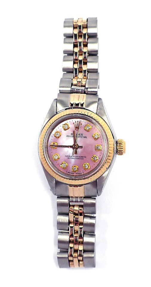 Lady Rolex Two-Tone Oyster Perpetual Wristwatch A3579: Lady Rolex Two-Tone Oyster Perpetual Wristwatch A3579. Great Condition! HG1081CZ. One ladies, hand crafted and machine milled Rolex Oyster Perpetual Model stainless steel and 14KT yellow gold wristwat