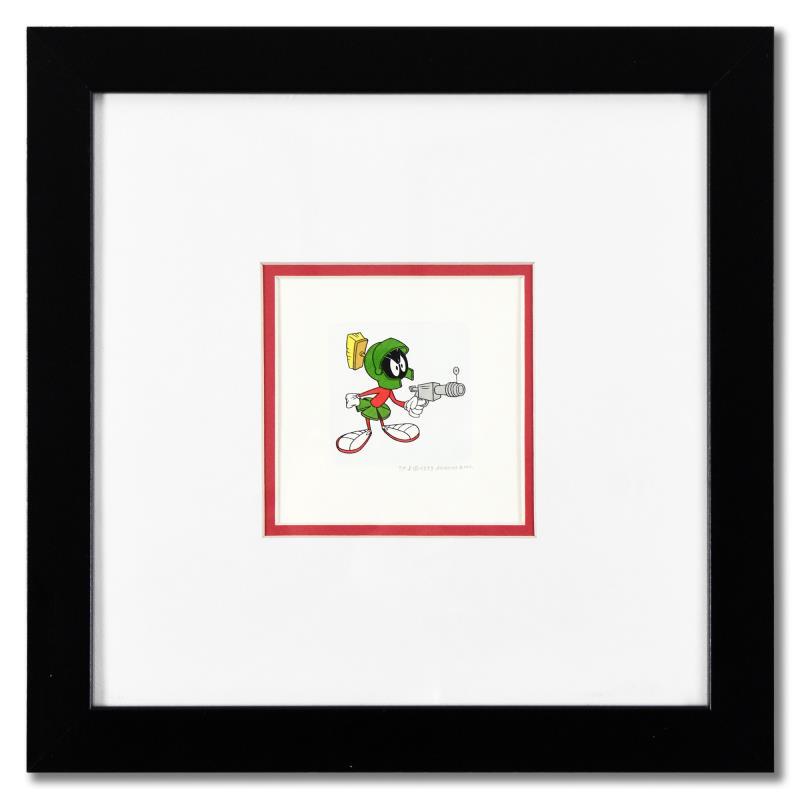 Marvin the Martian by Looney Tunes: Marvin the Martian by Looney Tunes. "Marvin the Martian" is a limited edition etching on paper with hand-tinted coloring from Warner Bros, numbered and dated 1999. This piece comes framed. Measures ap