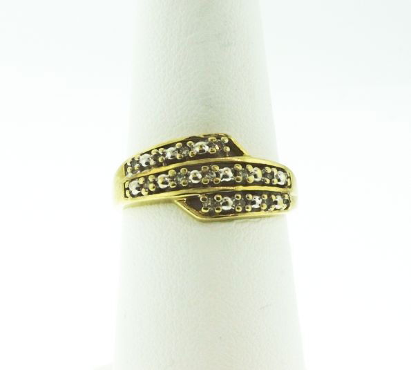 10KT Yellow Gold Diamond Ring .5ct GD71: "10KT Yellow Gold Diamond Ring .5ct GD71. Good Condition! QY27SF. One 10KT yellow gold diamond ring weighing 2.4g. Entails three rows of diamonds weighing 0.5ctw. Thank you for viewing this lot. We ar