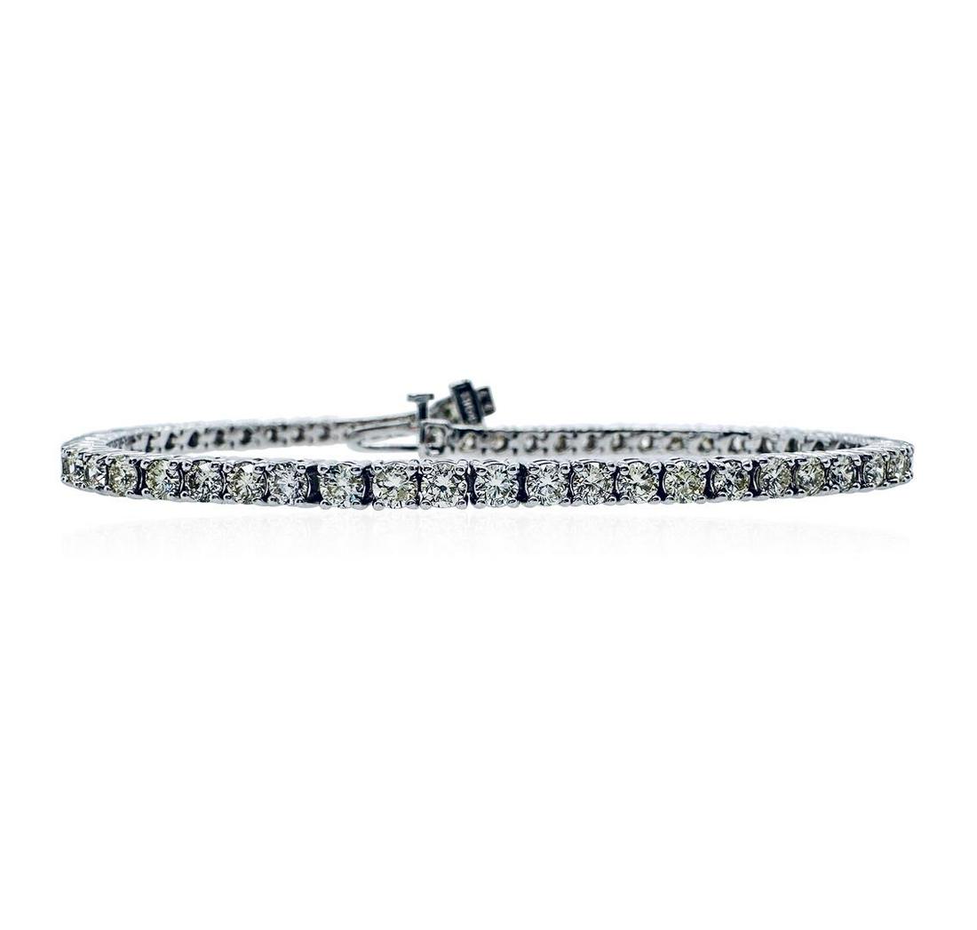 4.65 ctw Diamond Tennis Bracelet - 14KT White Gold: One electronically tested 14KT white gold lady's combination cast & assembled fashion straight line tennis bracelet with a tongue clasp with fold-under safety with a basket motif with a bright polish 