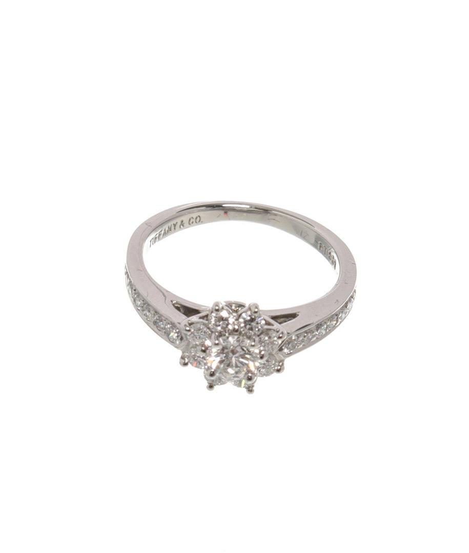 Tiffany & Co. Silver Flora Ring 4.5 48: Tiffany & Co. Silver Flora Ring 4.5 48. All available information is listed in the description and shown in the photos. Tiffany & Co. Silver Flora Ring with platinum, silver-tone hardware. 1 round