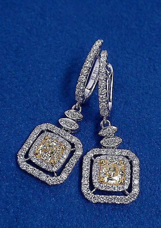 18KT White Gold 2.01ct Yellow and White Diamond Drop Ea: "18KT White Gold 2.01ct Yellow and White Diamond Drop Earrings FJM1068. New Condition! CL4622AU. One pair electronically tested 18KT white gold ladies cast and assembled diamond dangle style earrings.