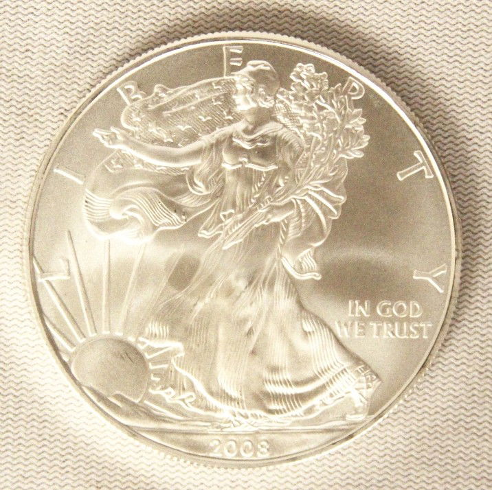 2008 American Silver Eagle COMS147: "2008 American Silver Eagle COMS147. As-Is Condition! AT14BV. 2008 American Silver Eagle. 1 oz. fine silver. Thank you for viewing this lot. We are always adding new inventory and new auctions, so che