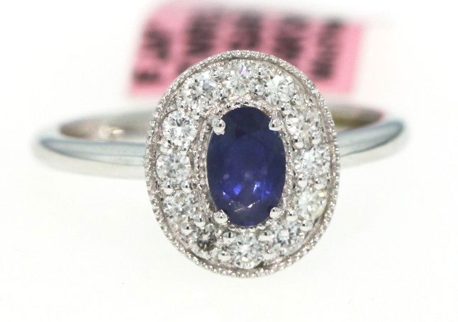 14KT White Gold .56ct Sapphire and Diamond Ring FJM922: 14KT White Gold .56ct Sapphire and Diamond Ring FJM922. Excellent Condition! TQ163KA. One 14KT white gold Michael Christoff sapphire and diamond ring. Features one oval cut sapphire weighing 0.56cts s