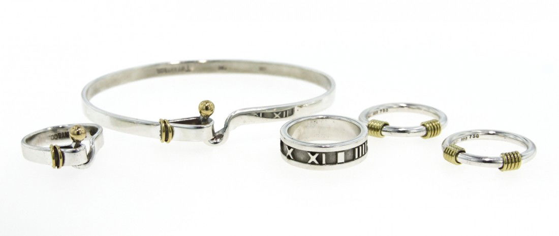 Tiffany and Co. Gold and Sterling Braclet and Ring Set : Tiffany and Co. Gold and Sterling Braclet and Ring Set GD386. Good Condition! YB103NW. One Tiffany and Co. gold and sterling bangle bracelet and rings set. Consists of one bangle bracelet and 4 rings,
