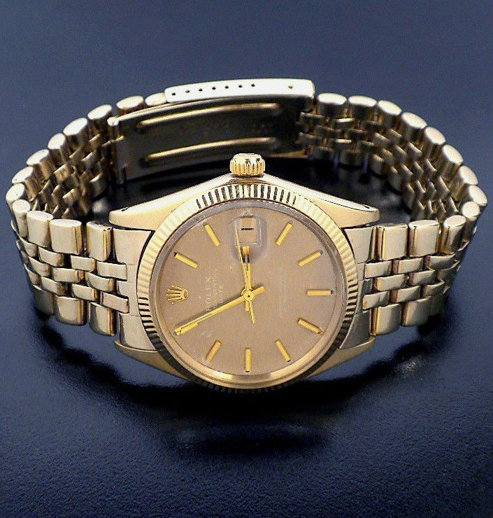 Gents Rolex 14KT Gold Date Model Wristwatch A3673: "Gents Rolex 14KT Gold Date Model Wristwatch A3673. Great Condition! US1524RX. One, hand crafted and machine milled Rolex Date Model wristwatch electronically tested 14KT yellow gold. Case: 34mm oyste