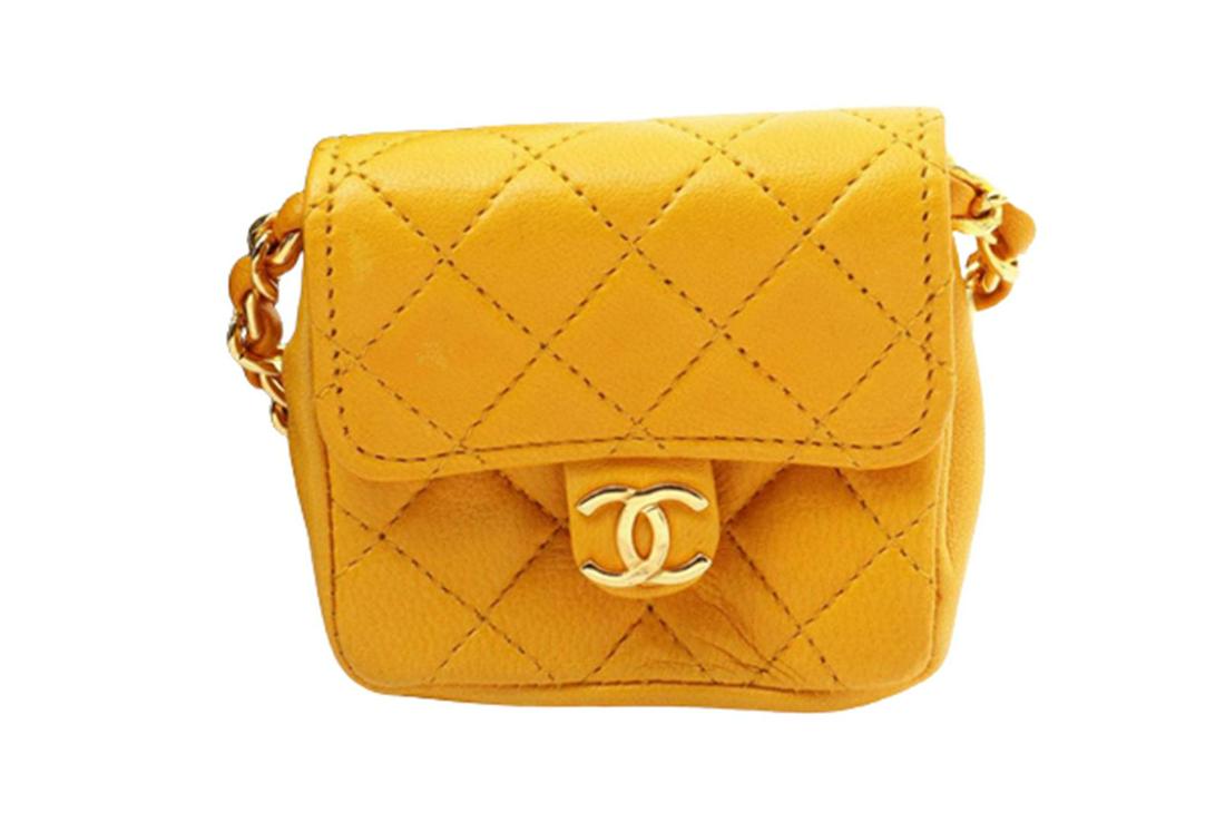 Chanel Yellow Quilted Leather Flap Micro Flap Bag: One Chanel Yellow Quilted Leather Flap Micro Flap Bag. Item is sold AS-IS. All available information is listed in the description and shown in the photo. Yellow quilted leather Chanel Micro Flap bag w