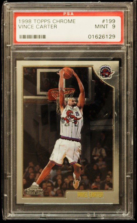 1998 Topps Chrome Vince Carter Rookie Card C229: 1998 Topps Chrome Vince Carter Rookie Card C229. As-Is Condition! NO12NV. One 1998 Topps Chrome Vince Carter Rookie Card #199. PSA Graded: 9. Team: Toronto Raptors. Thank you for viewing this lot. We 