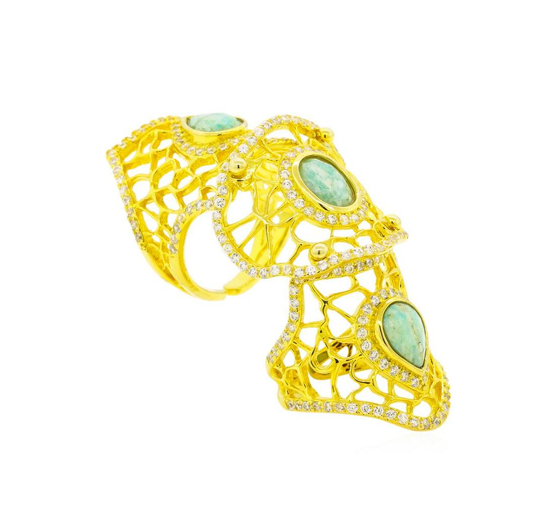 Sterling Silver Ring: One of a kind high fashion sterling silver Ring weighing 13 grams. Containing: Amazonite, Cubic Zirconia. This sterling silver promises a lasting shine.