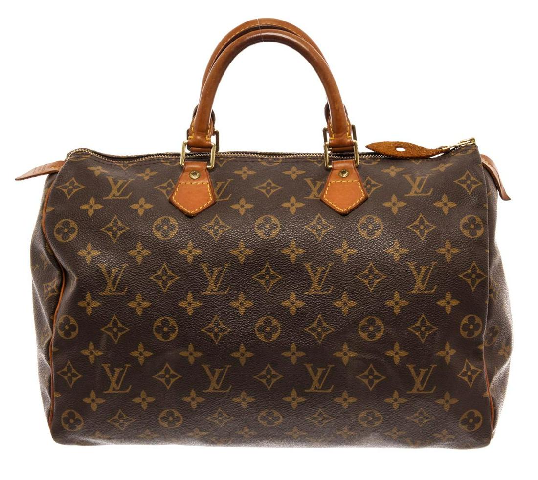 Louis Vuitton Brown Monogram Canvas Speedy 35 Satchel Bag: Louis Vuitton Brown Monogram Canvas Speedy 35 Satchel Bag. All available information is listed in the description and shown in the photos. Louis Vuitton Brown Monogram Canvas Speedy 35 Satchel Bag wit
