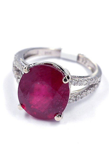 14KT White Gold 6.22ct Ruby and Diamond Ring J22: 14KT White Gold 6.22ct Ruby and Diamond Ring J22. New Condition! BO824ZZ. One electronically tested 14KT white gold ladies cast ruby and diamond ring. Good workmanship. The featured ruby is supported 