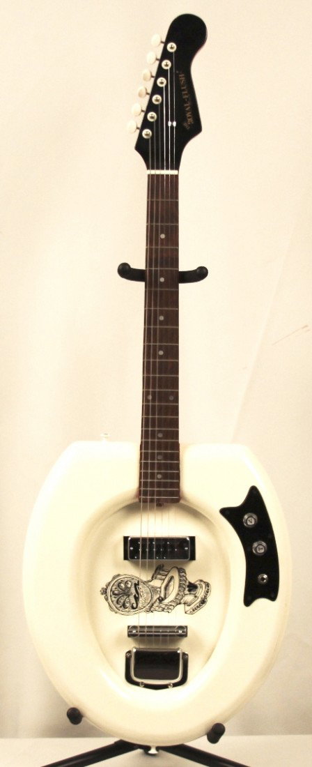 Royal Flush White Toilet Guitar DGUI22: Royal Flush White Toilet Guitar DGUI22. Great Condition! DX432EC. This is a British designed white toilet guitar called the Royal Flush". It does play and is much more than a wallhanger. Be it stage o