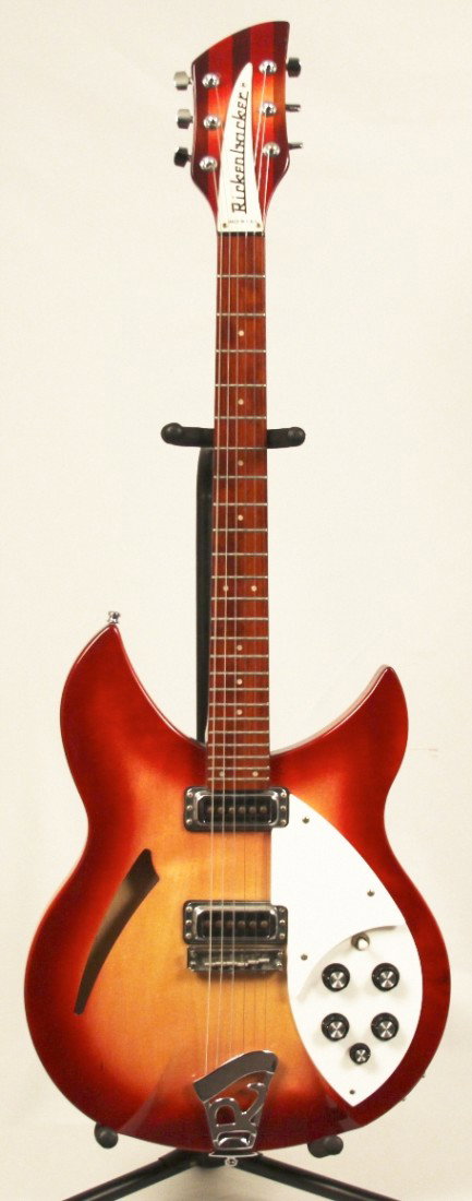 Rickenbacker 330-6 Fireglow Electric Guitar MGUI4: Rickenbacker 330-6 Fireglow Electric Guitar MGUI4. Excellent Condition! HE9911NA. That great jingle jangle tone heard on everything from the Beatles to Tom Petty is the wonderful sound a Rickenbacker 