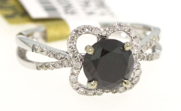 18KT White Gold 2.06ct Black and White Diamond Ring RM4: 18KT White Gold 2.06ct Black and White Diamond Ring RM417. Great Condition! ZA794BA. One lady's polished, stamped and electronically tested solid 18KT white gold ring mounted with: 1 genuine round bla