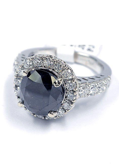14KT White Gold 3.97ct Black and White Diamond Ring J42: 14KT White Gold 3.97ct Black and White Diamond Ring J42. New Condition! CQ7611HS. One electronically tested 14KT white gold ladies cast black and white diamond ring. Good workmanship. The featured bla