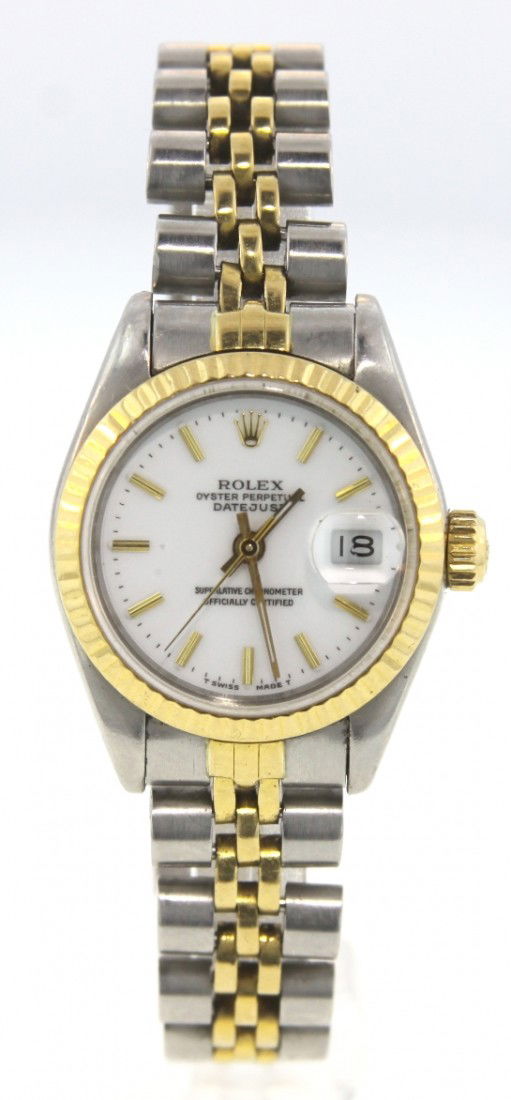 Lady Rolex Two-Tone DateJust Wristwatch ML20: Lady Rolex Two-Tone DateJust Wristwatch ML20. Great Condition! VL6561EP. One ladies, hand crafted and machine milled Rolex DateJust Model stainless steel and 18KT yellow gold wristwatch electronically