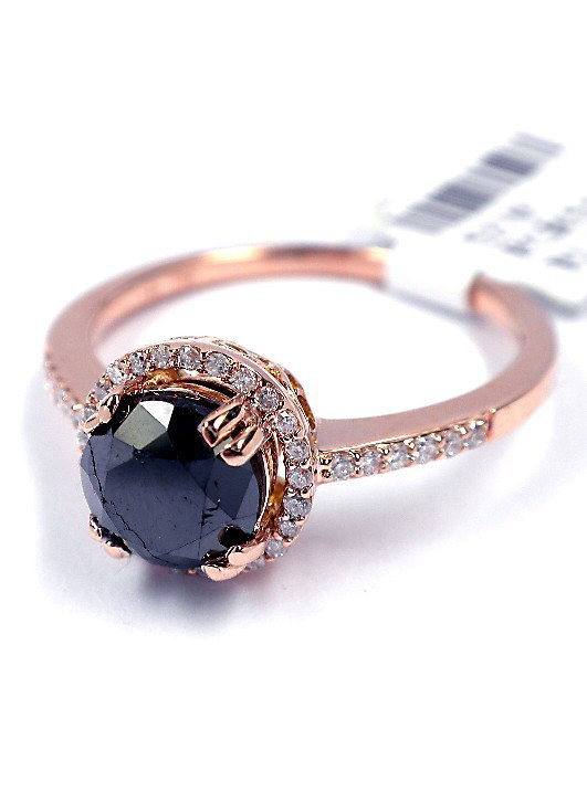 14KT Rose Gold 1.54ct Black and White Diamond Ring J43: 14KT Rose Gold 1.54ct Black and White Diamond Ring J43. New Condition! KN584LE. One electronically tested 14KT rose gold ladies cast black and white diamond ring. Good workmanship. The featured diamon