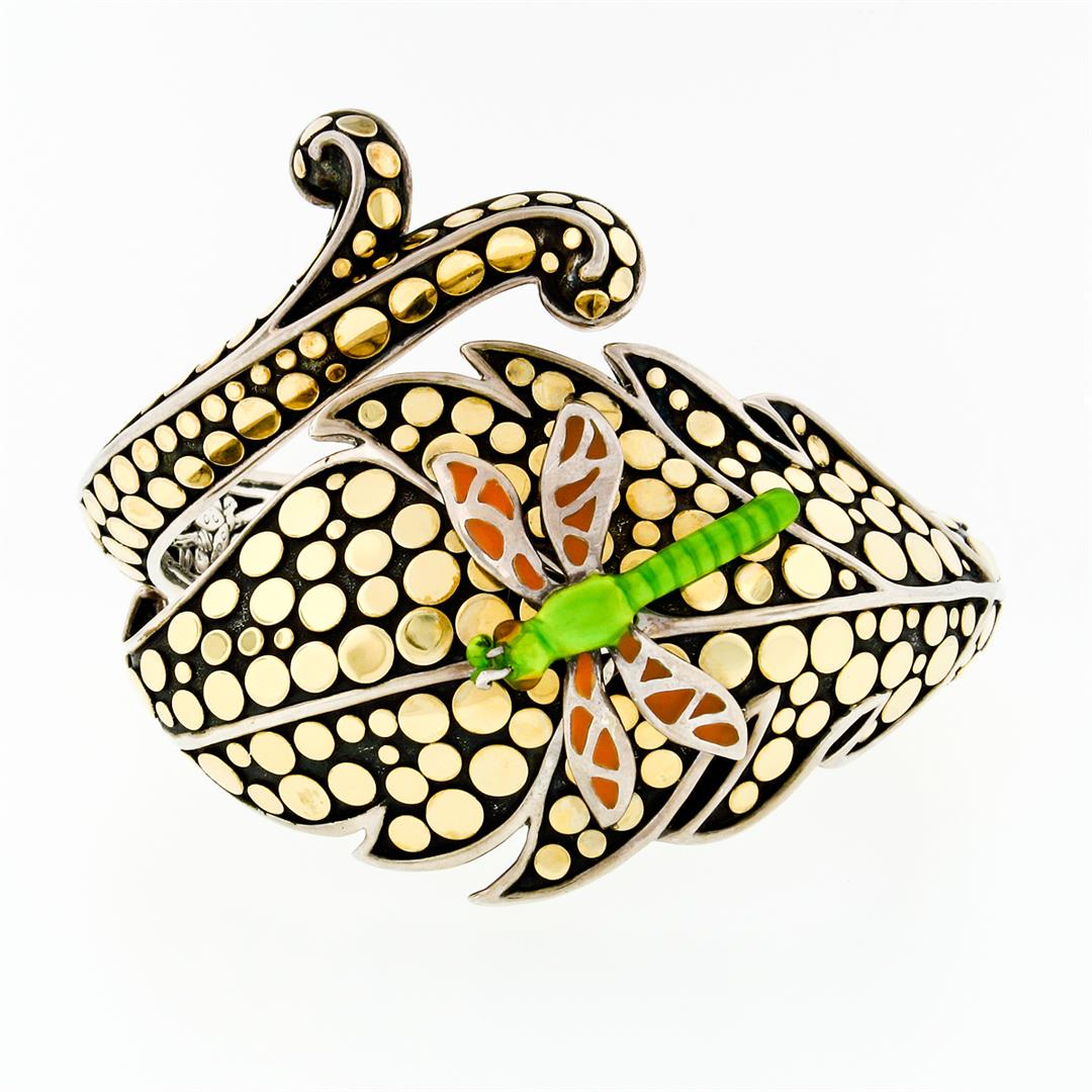 John Hardy Dot Silver & 18k Gold Leaf & Enamel Dragonfly Hinged Bangle Bracelet: An authentic John Hardy sterling silver and 18k yellow gold hinged bangle leaf bracelet, topped with a green and orange enamel dragonfly. It weighs a total of 106.71 grams, measures 56.68mm wide, and
