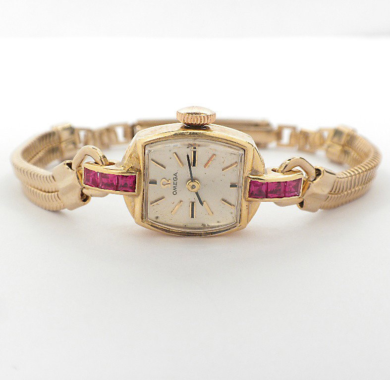 14KT Yellow Gold Ladies Vintage Omega Wristwatch A3702: "14KT Yellow Gold Ladies Vintage Omega Wristwatch A3702. Good Condition! HG5201MN. One ladies, cast & assembled, vintage Omega wristwatch electronically tested. Case: Gruen 14KT yellow gold 18x14mm, B