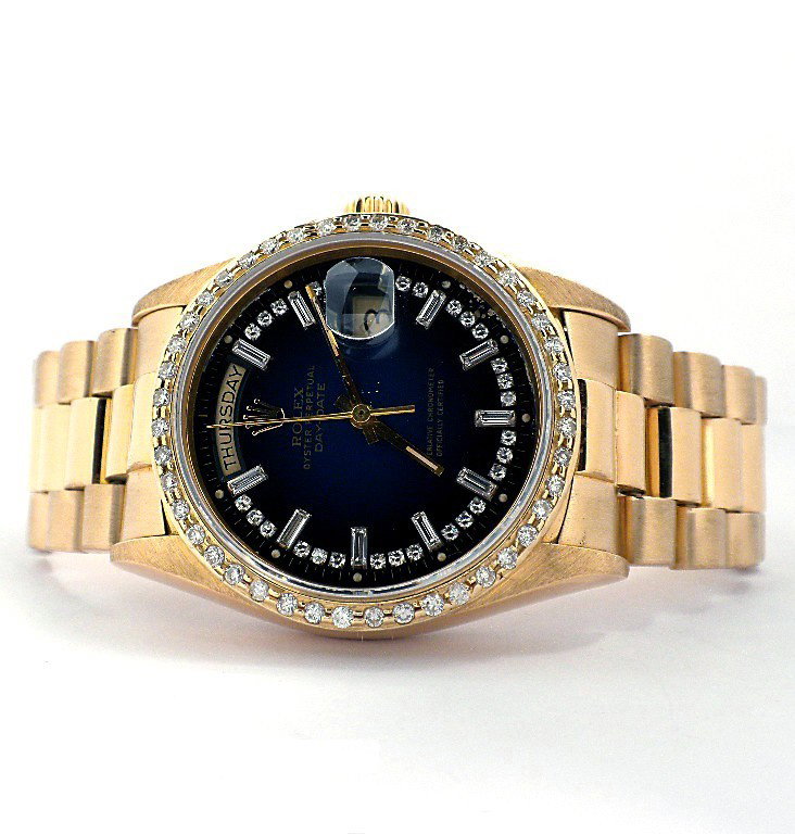 Gents Rolex 18KT Gold DayDate Wristwatch A3687: "Gents Rolex 18KT Gold DayDate Wristwatch A3687. Good Condition! TL1628PR. One gents, hand crafted & machine milled Rolex DayDate Model The President wristwatch electronically tested 18KT yellow gold,