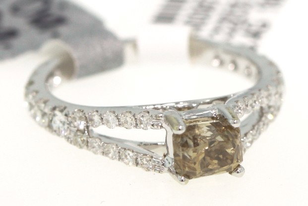 18KT White Gold 1.74ct Brown and White Diamond Ring RM4: "18KT White Gold 1.74ct Brown and White Diamond Ring RM414. Great Condition! GE6901AU. One electronically tested 18KT white gold ladies cast diamond ring with a bright polish finish. Good workmanship.