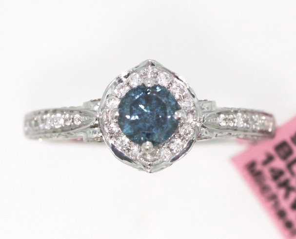 14KT White Gold 0.55ct Blue & White Diamond Ring FJM139: 14KT White Gold 0.55ct Blue & White Diamond Ring. Excellent Condition! IQ166XF. This beautiful 14KT White Gold Semi-Mount Ring features (1) Blue Diamond(s) weighing approximately 0.55cts and (94) Roun