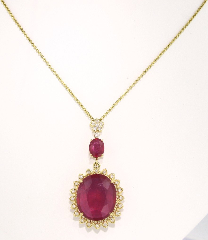 14KT Yellow Gold 37.43ct Ruby and Diamond Pendant and C: "14KT Yellow Gold 37.43ct Ruby and Diamond Pendant and Chain RM424. Great Condition! AG9771VN. Oe lady's polished stamped and electronically tested solid 14KT yellow gold pendant mounted with: 1 large