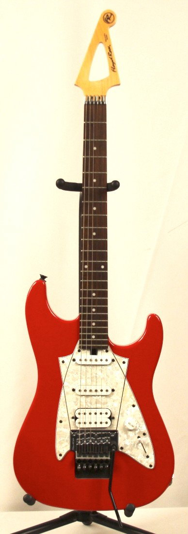 Floyd Rose Discovery Red Strat Electric Guitar DGUI19: "Floyd Rose Discovery Red Strat Electric Guitar DGUI19. Great Condition! NB831FU. The Floyd Rose line of discovery type stratocasters does use a Floyd Rose tremolo and can be divebombed "Eddie" style 