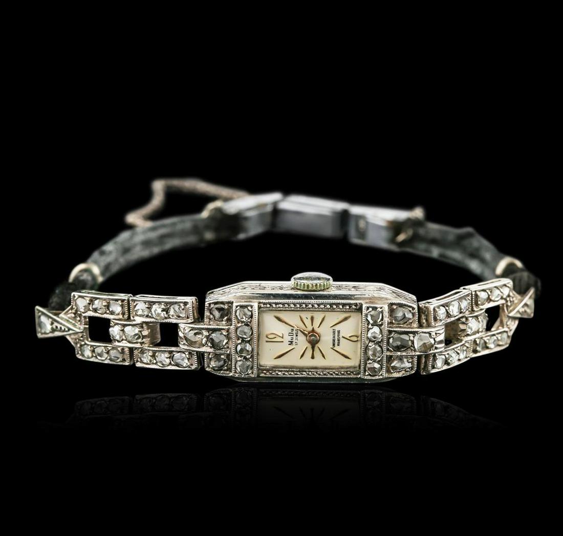 Art Deco 14KT White Gold Diamond Vintage Ladies Watch: One ladies, vintage "Art Deco" style wristwatch electronically tested 14KT white gold, Case: 25 x 11mm with a hinged back, Case Back: space available for engraving, Flexible Case Lugs: set throughout