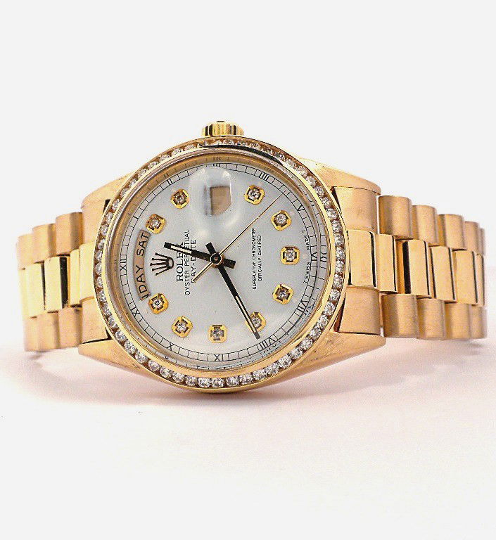 Gents Rolex 18KT Yellow Gold President w/ Diamond Bezel: "Gents Rolex 18KT Yellow Gold President w/ Diamond Bezel A3681. Good Condition! VT1197PL. One gents, hand crafted & machine milled RoIex DayDate Model #1803 President wristwatch electronically tested