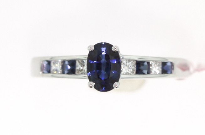 14KT White Gold 1ct Sapphire and Diamond Ring FJM1390: "14KT White Gold 1ct Sapphire and Diamond Ring. Excellent Condition! NS405UZ. This beautiful 14KT White Gold Ring features (5) Sapphire(s) weighing approximately 1cts and (4) Princess Cut Diamond(s) w