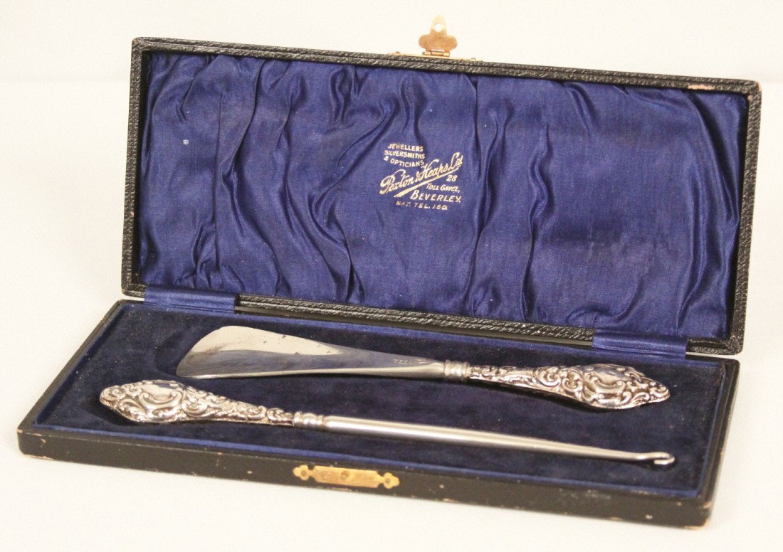 Antique Victorian Sterling Shoe Horn and Button Hook ED: "Antique Victorian Sterling Shoe Horn and Button Hook ED1136. Good Antique Condition! GN101HK. Gorgeous antique Victorian sterling shoe horn and button hook set in its original case by Rexton Jeweller