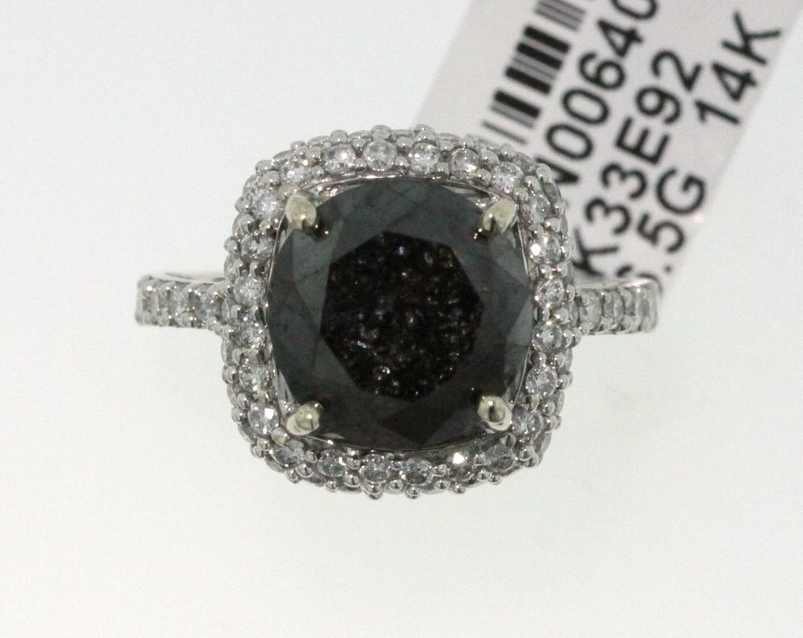14KT White Gold 5.7ct Black & White Diamond Ring RM473: "14KT White Gold 5.7ct Black & White Diamond Ring RM473. New Condition! MC1411MR. One electronically tested 14KT white gold ladies cast black & white diamond ring. Condition is new, good workmanship. 