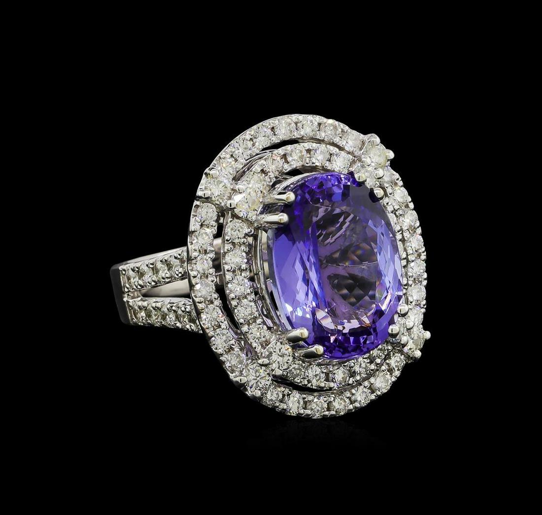 9.81 ctw Tanzanite and Diamond Ring - 14KT White Gold: One electronically tested 14KT white gold lady's combination cast & assembled fashion ring with a split shank double halo with a bright polish finish. The featured lady's ring has a shank measuring 3.