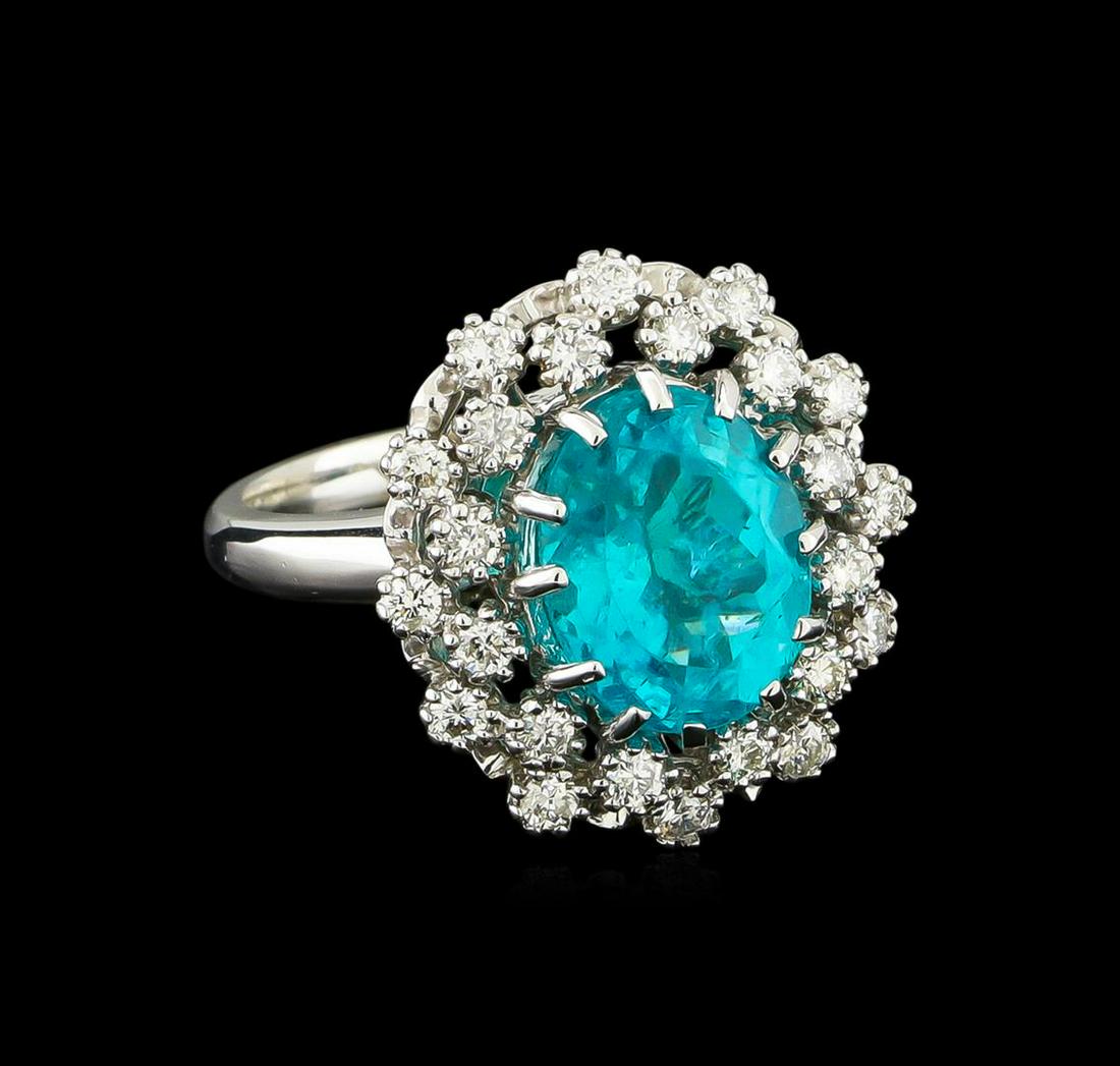 4.08 ctw Apatite and Diamond Ring - 14KT White Gold: One Ring featuring: 14KT White Gold weighing 6.82 grams containing one Apatite center stone with a total weight of 4.08ct and Diamonds with a total weight of 0.6ct.