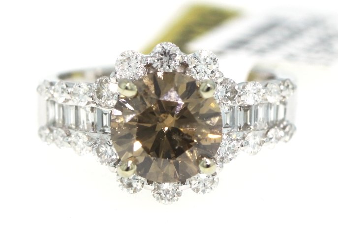 18KT White Gold 3.21ct Brown and White Diamond Ring RM3: 18KT White Gold 3.21ct Brown and White Diamond Ring RM377. New Condition! KP7884TN. One electronically tested 18KT white gold ladies cast diamond ring with a bright polish finish. Good workmanship. Th