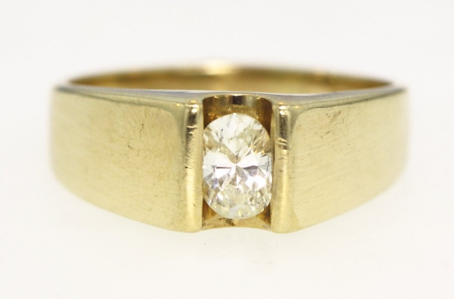 14KT Yellow Gold 0.53ct Diamond Solitaire Ring A3328: 14KT Yellow Gold 0.53ct Diamond Solitaire Ring A3328. Good Condition! MD157FA. One electronically tested 14KT yellow gold ladies cast diamond solitaire ring with a brigh polish finish. Identified with