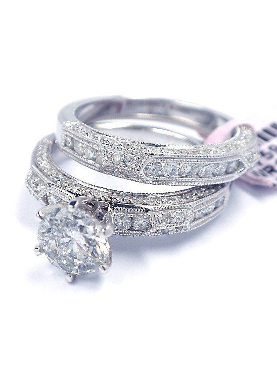 14KT White Gold 2.19ct Diamond Wedding Ring Set FJM1436: 14KT White Gold 2.19ct Diamond Wedding Ring Set FJM1436. As-Is Condition! X1462MN. One 14KT White Gold Diamond Wedding Ring Set. Total weight of diamonds is 2.19ct. Total weight of the set is 8.10gm.