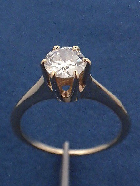 14KT Yellow Gold .65ct Diamond Solitaire Ring A3193: 14KT Yellow Gold .65ct Diamond Solitaire Ring A3193. Good Condition! DK884YL. One electronically tested 14KT yellow gold ladies cast diamond solitaire ring with a bright finish. Total weight of diamon