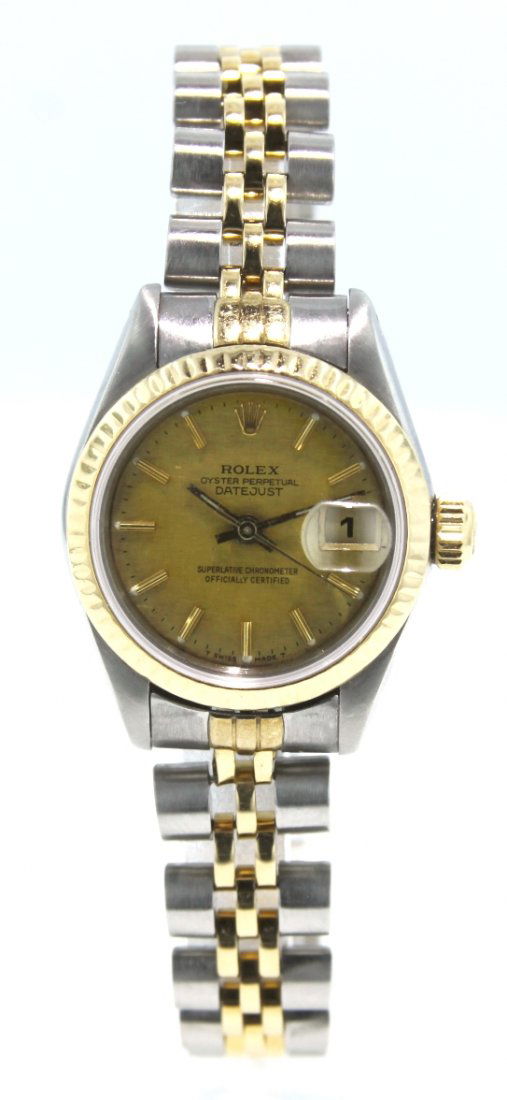 Lady Rolex Two-Tone DateJust Model Watch ML16: Lady Rolex Two-Tone DateJust Model Watch ML16. Great Condition! MN1651GS. One ladies, hand crafted and machine milled Rolex DateJust Model stainless steel and 14KT yelow gold wristwatch electronically