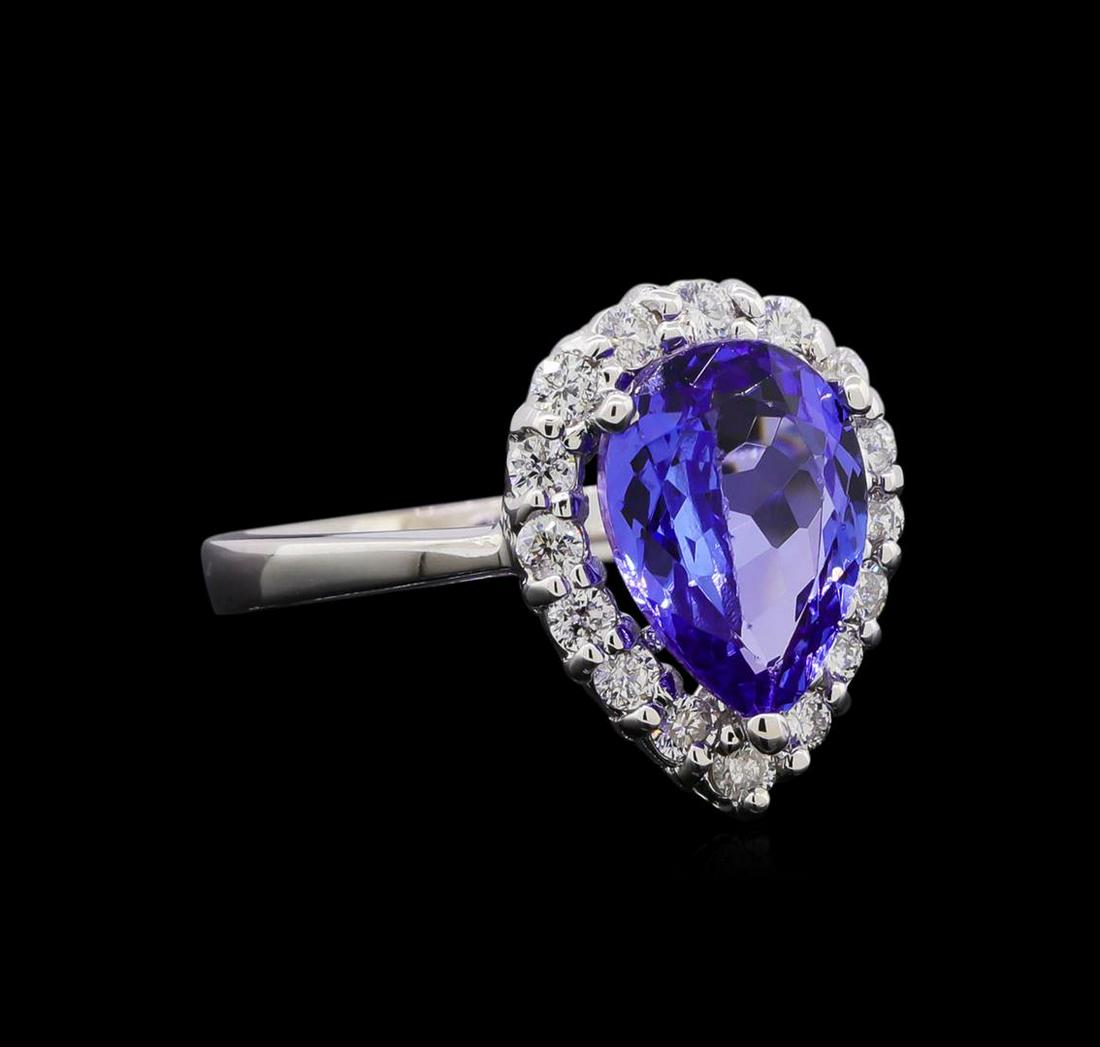 3.02 ctw Tanzanite and Diamond Ring - 14KT White Gold: One ring featuring: 14KT white gold weighing 4.65 grams containing one tanzanite center stone with a total weight of 3.02ct and diamonds with a total weight of 0.45ct.