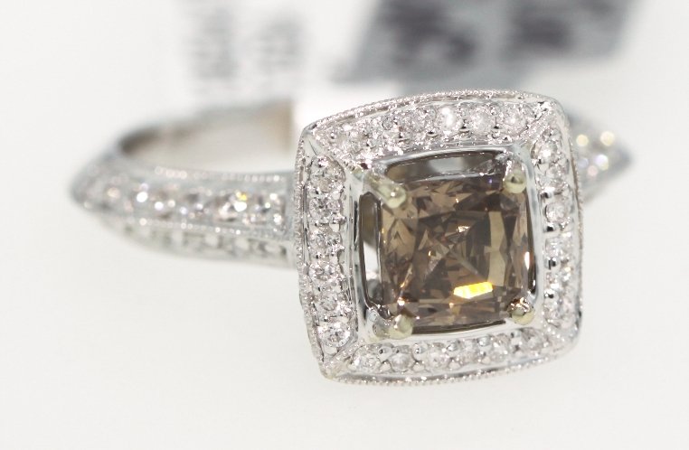18KT White Gold 1.78ct Brown and White Diamond Ring RM2: "18KT White Gold 1.78ct Brown and White Diamond Ring RM228. New Condition! CC6891ST. One electronically tested 18KT white gold ladies cast diamond ring. Good workmanship. The featured diamond is set w