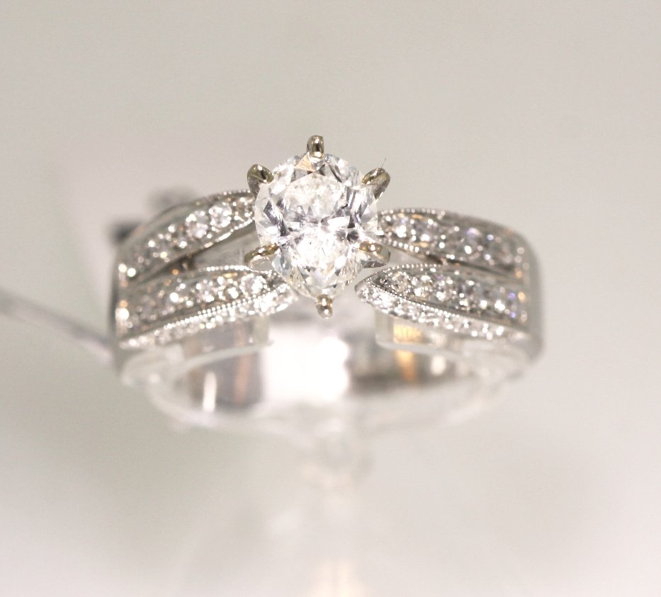 18KT White Gold 1.46ct Diamond Wedding Ring RM444: "18KT White Gold 1.46ct Diamond Wedding Ring RM444. Excellent Condition! RT5823KJ. One electronically tested 18KT white gold ladies cast & assembled diamond unity ring with a bright and milgrain finis