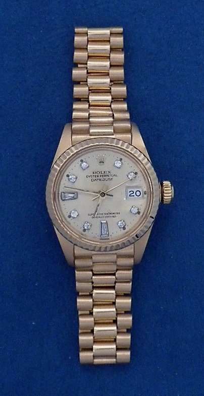 Ladies 18KT Yellow Gold Rolex DateJust Wristwatch A3674: "Ladies 18KT Yellow Gold Rolex DateJust Wristwatch A3674. Great Condition! CM1524BW. One ladies, hand crafted and machine milled Rolex Lady President, the DateJust model wristwatch electronically test