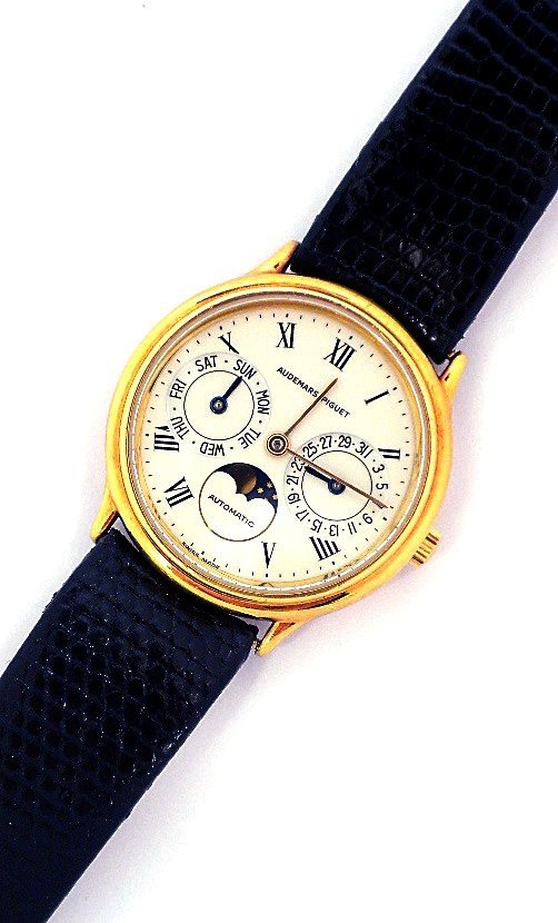 18KT Gold Audemars Piguet Classic Round Day Date Moon P: "18KT Gold Audemars Piguet Classic Round Day Date Moon Phase Watch ACR3. Great Condition! WH5084RF. One gents, Audemars Piguet Wristwatch electronically tested 18KT yellow gold, Case: 33mm, Bezel: 18K